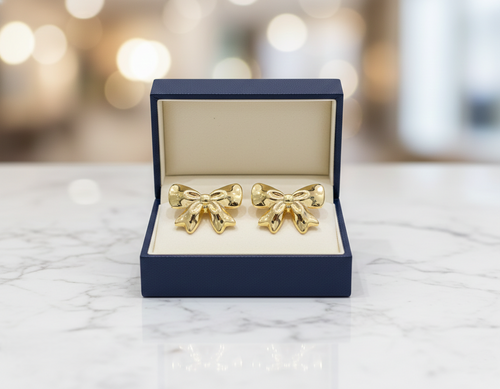Kevira Golden Bow Statement Earrings