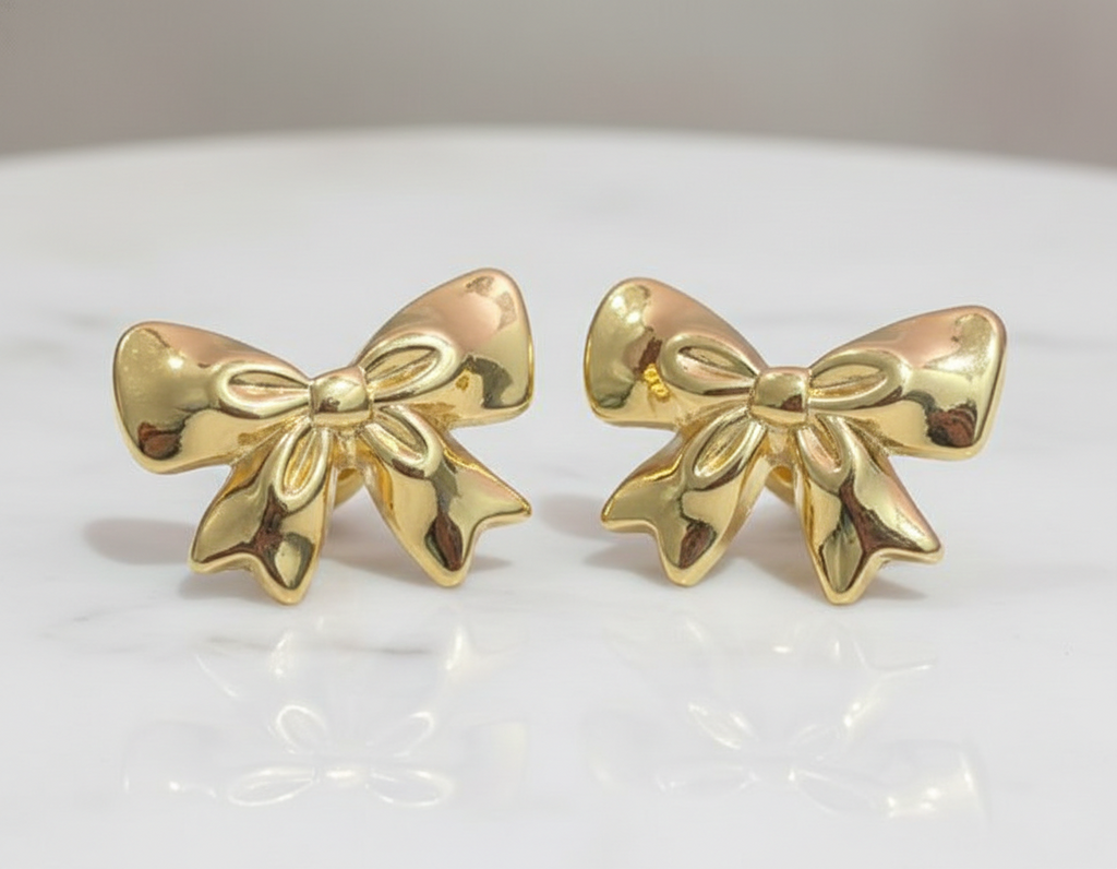 Kevira Golden Bow Statement Earrings