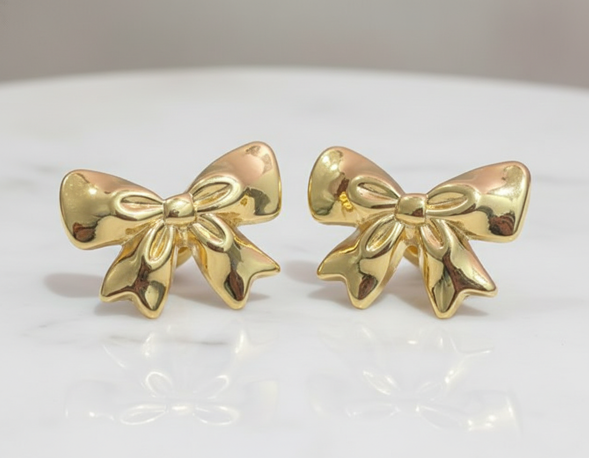 Kevira Golden Bow Statement Earrings