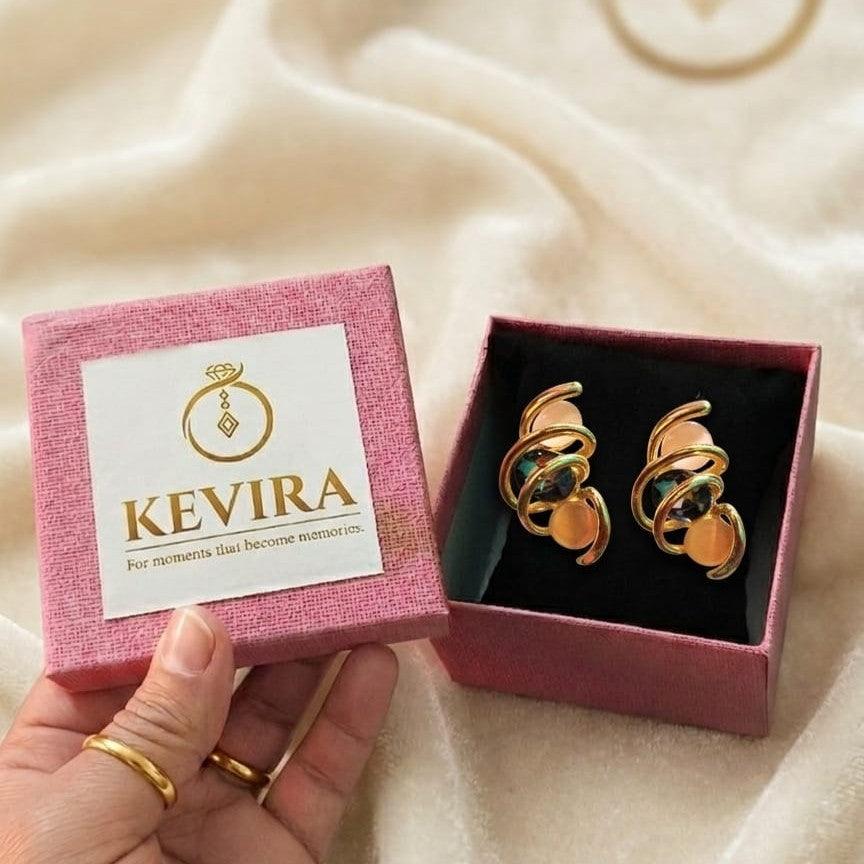 Kevira Emerald Orbit Statement Studs